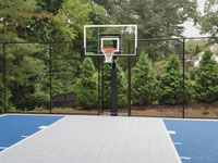 Residential basketball court in shades of blue in Lexington, MA.
