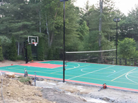 Backyard basketball court plus tennis and volleyball in Pembroke, MA. We could install backyard basketball for you in Sagamore, Avon, Abington, Whitman, Cambridge or Norwood.