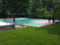 Backyard basketball surface, hoops, lights, and rebound fence in Pembroke, MA. We sport basketball and other courts that can be yours in Boston, Dighton, Westport, Swansea, Watertown or Acushnet.