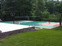 Backyard tennis court in Pembroke, MA. Backyard basketball, volleyball or tennis by Naturescape could be yours in Hyde Park, Onset, Centerville, Osterville, or Carver.