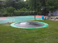 We installed the in-ground trampoline in the foreground, along with the background court for various sports like basketball, volleyball and tennis, and the finish sod and landscaping touches. Durable sport surfaces like this could be yours, from the city to villages like Craigville, Bryantville, Monponsett, Elmwood, or Pleasant Lake.