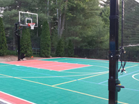 Backyard basketball court in Pembroke, MA. Whatever your sport, you could have a court surface and accessories of your own in Somerville, Medford, Everett, Malden or Revere.