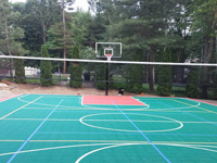 Backyard basketball court in Pembroke, MA. Whatever your sport, you could have a court surface and accessories of your own in Winthrop, Nahant, Melrose, Chelsea or Dorchester.