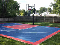 Backyard basketball court in Canton, MA. Whatever your sport, you could have a court surface and accessories of your own in Westford, Littleton, Ayer, Harvard or Berlin.