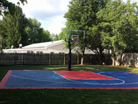 Backyard basketball court in Canton, MA. Whatever your sport, you could have a court surface and accessories of your own in Maynard, Waltham, Marlborough, Westborough or Upton.