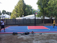 Backyard basketball court in Canton, MA. We could install backyard basketball for you, too, in nearby Rhode Island, like Cumberland, Lincoln, Pawtucket, East Providence, and Warren.