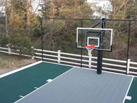 Backyard basketball court in Plymouth, MA. Whatever your sport, you could have a court surface and accessories of your own in Fairhaven, Hanson, Rockland, Berkley or Randolph.