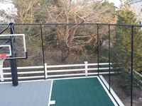 Backyard basketball court in Plymouth, MA. Whatever your sport, you could have a court surface and accessories of your own in Somerset, Chatham, Lexington, Wayland or Sherborn.