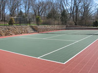 Tennis court as part of a major landscape construction project, including walls and driveway, in Newport, RI