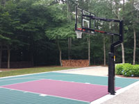 Basketball half court in Dartmouth, MA. Court can be parked on or driven over.