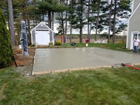 Backyard basketball court in Duxbury, MA. We can build your dream court in a wide range of sizes. You might be surprised where one can fit into your yard.