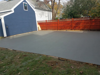 Backyard basketball court is the sort of thing you might find in Fairhaven, MA or a yard like yours. Before the court surface is installed, preparing a quality base adds durability.