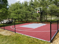 Red and titanium home basketball court in Groton, MA.