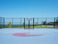 Large basketball court we resurfaced at GreatHorse Golf Club in Hampden, MA, using Versacourt Speed Outdoor Tile.