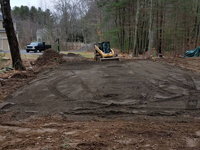 Backyard basketball court as part of a larger project including stump removal, landscaping, firepit and a putting green in Hanover, MA.