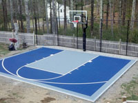 Basketball court with rebounder on quality concrete base in Kingston, MA