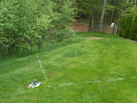 Before construction of backyard basketball court that doubles for tennis in Kingston, MA