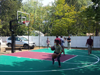 Backyard basketball court in Natick, MA.