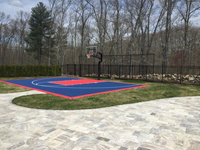 Backyard basketball court in North Attleboro, MA. We could install backyard basketball for you, too, in nearby Rhode Island, like Cumberland, Lincoln, Pawtucket, East Providence, and Warren.