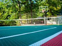 Backyard basketball court in Pembroke, MA.