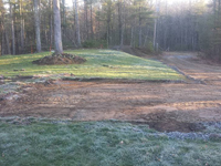 Before driveway with a court on it in Plympton, MA