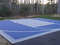 Driveway basketball court in Plympton, MA
