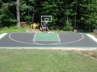 Basketball court done except landscaping/clean-up in Raynham, MA