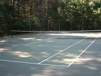 Before large commercial tennis court and multicourt facelift in Duxbury, MA. This could easily be your apartment or condo complex sport and game court in eastern Massachusetts being revitalized.