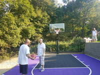 Backyard basketball court in Stoneham, MA.