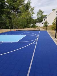 Groveland blue basketball court with pickleball.
