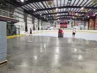 We traveled to Kapolei, Hawaii and inside to resurface two inline skate hockey rinks with Versacourt Speed Indoor tile. This shows inline tile installation perhaps halfay complete, in progress on the first rink.