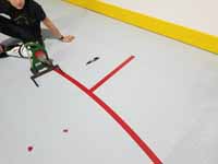 We traveled to Kapolei, Hawaii and inside to resurface two inline skate hockey rinks with Versacourt Speed Indoor tile. This is a look at the painstaking process of adding hockey court lines that couldn't be manufactured in.