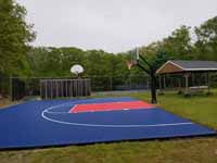Colorful blue and red basketball court in Seekonk, MA.