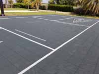 Combination court for pickleball, shuffleboard and some basketball installed on Jumby Bay Island (Long Island) in Antigua. Portable pickleball net coming soon.